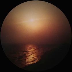 Sun shining through clouds