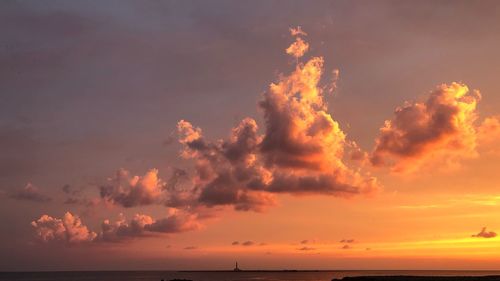 Low angle view of dramatic sky during sunset