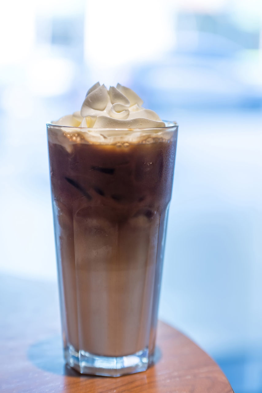 CLOSE-UP OF DRINK ON ICE