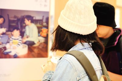 Rear view of woman wearing hat