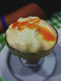 Close-up of hand holding ice cream