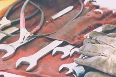 Close-up of old metallic objects on table