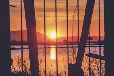 Scenic view of sea against orange sky