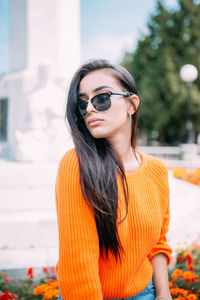 Portrait of young woman wearing sunglasses