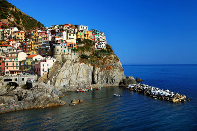 Residential district on rocky mountain by sea