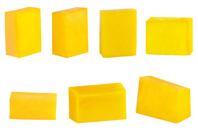 Close-up of yellow soap over white background