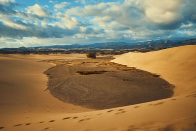 Scenic view of desert against sky