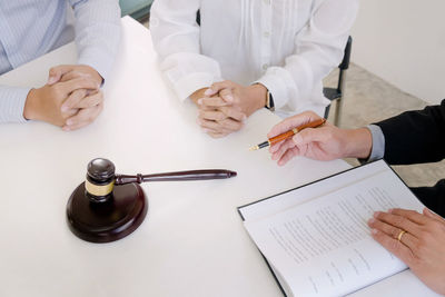 High angle view of people on table