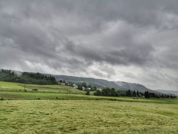 Scenic view of field against sky
