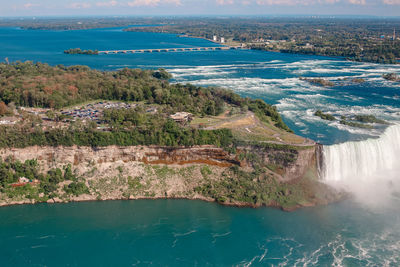 Aerial top landscape view of niagara falls between united states of america and canada. 