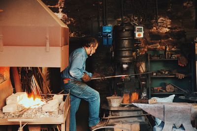 Side view of man working