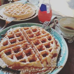 High angle view of waffles in plates on table