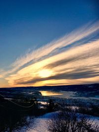 Scenic view of sea against sky during winter