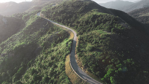 High angle view of road amidst trees