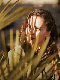 Portrait of young woman looking away