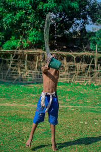 Boy playing with water 