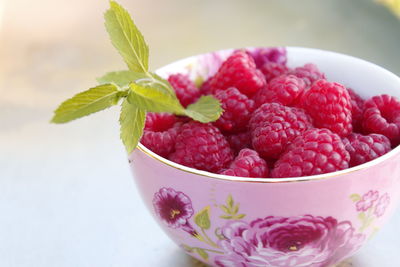 Close-up of strawberries in bowl on table