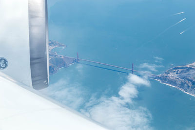 Aerial view of sky seen through airplane window