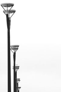 Low angle view of street light against sky