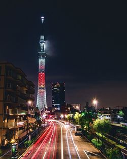 Illuminated city buildings at night