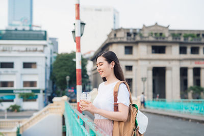 Woman looking at city