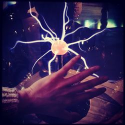 Close-up of woman holding camera