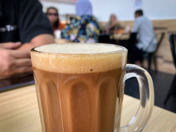 Close-up of coffee cup on table