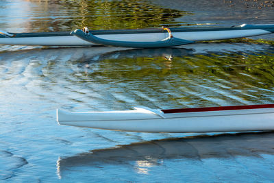 High angle view of boat moored in lake