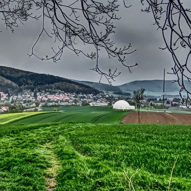 landscape, field, grass, tranquil scene, green color, tranquility, rural scene, agriculture, tree, sky, scenics, beauty in nature, nature, building exterior, farm, growth, built structure, architecture, grassy, mountain