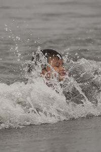 Man surfing in sea