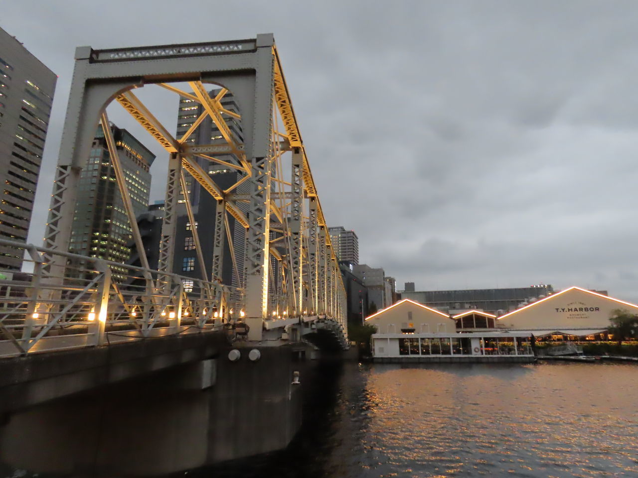 VIEW OF BRIDGE OVER RIVER AGAINST SKY