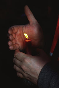 Close-up of man holding hands