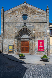 Facade of a stone church in  bolsena, ancient village on the lake of the same name, lazio, italy