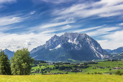 Scenic view of landscape and mountains against sky