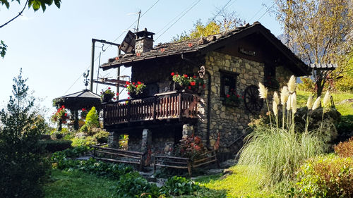 Low angle view of abandoned building against clear sky