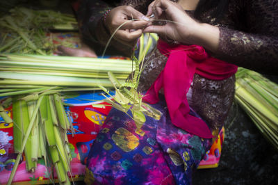 High angle view of woman holding colorful candies