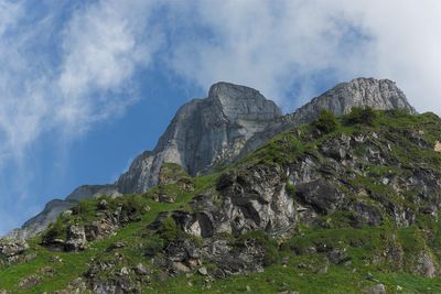 Rock formations on mountain against sky