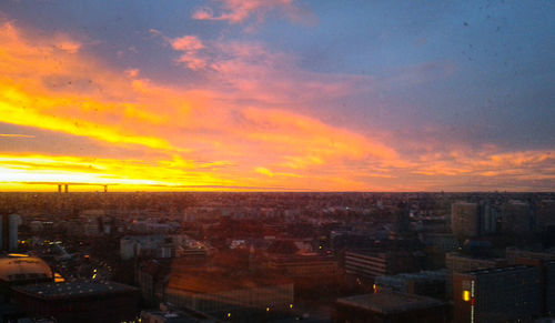 High angle view of city during sunset