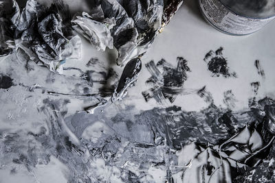 High angle view of frozen water on land