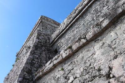 Low angle view of old building against clear sky