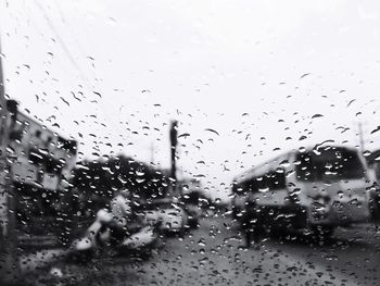 Full frame shot of wet window during rainy season