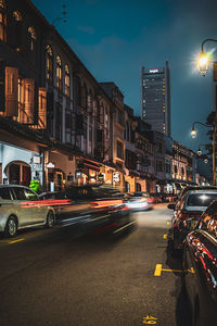 Traffic on city street at night