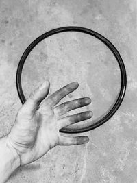 High angle view of person hand holding paper