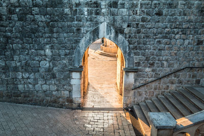 View of temple against building wall