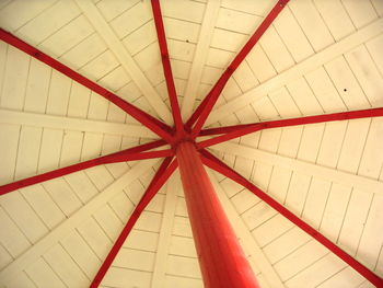 Low angle view of red umbrella