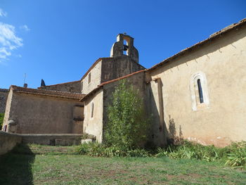 Low angle view of old building against sky