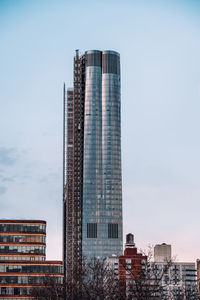 Low angle view of modern buildings against sky