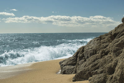 A clear day on the beach with blue sky