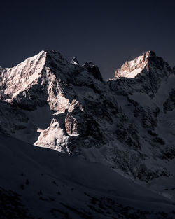 Sun breaking the snow