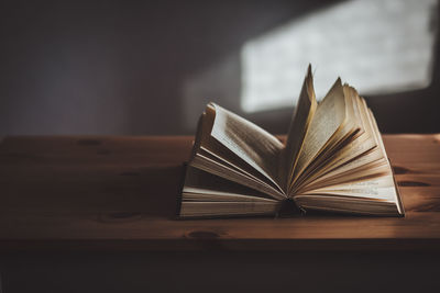 Close-up of open book on table